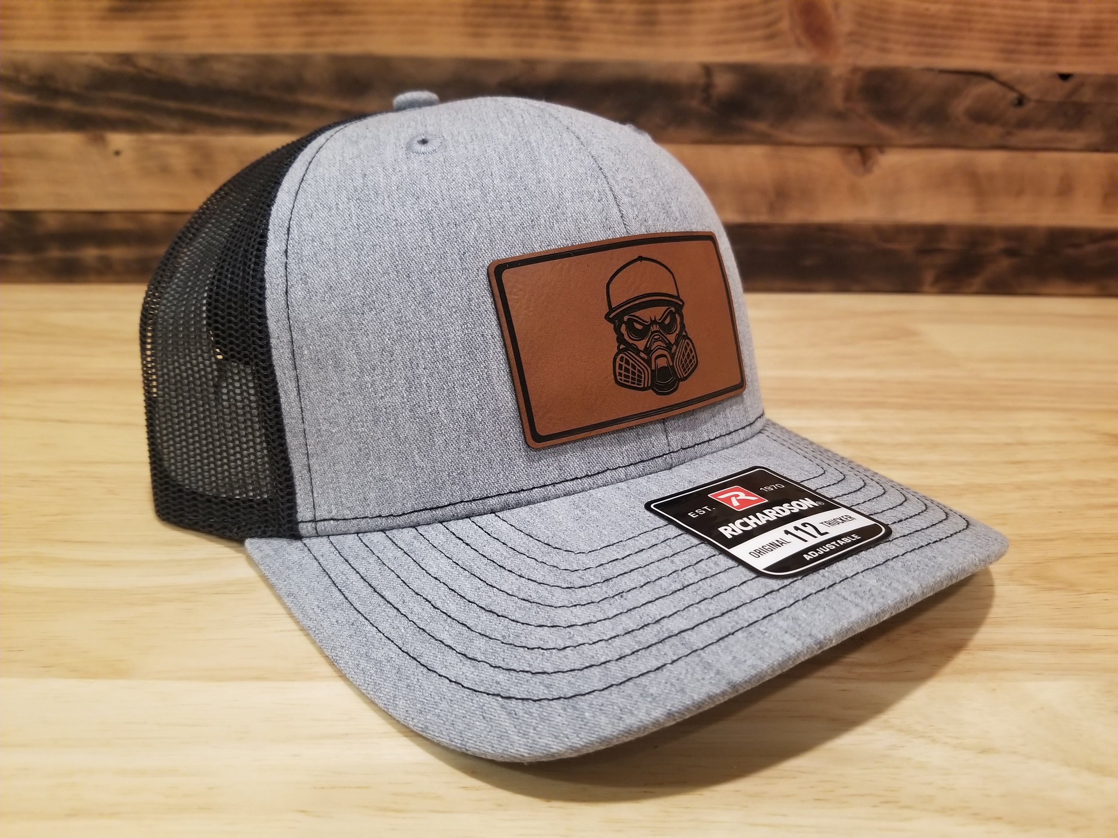Body Shop Merch Hat with Rawhide Skull wearing paint mask and cap