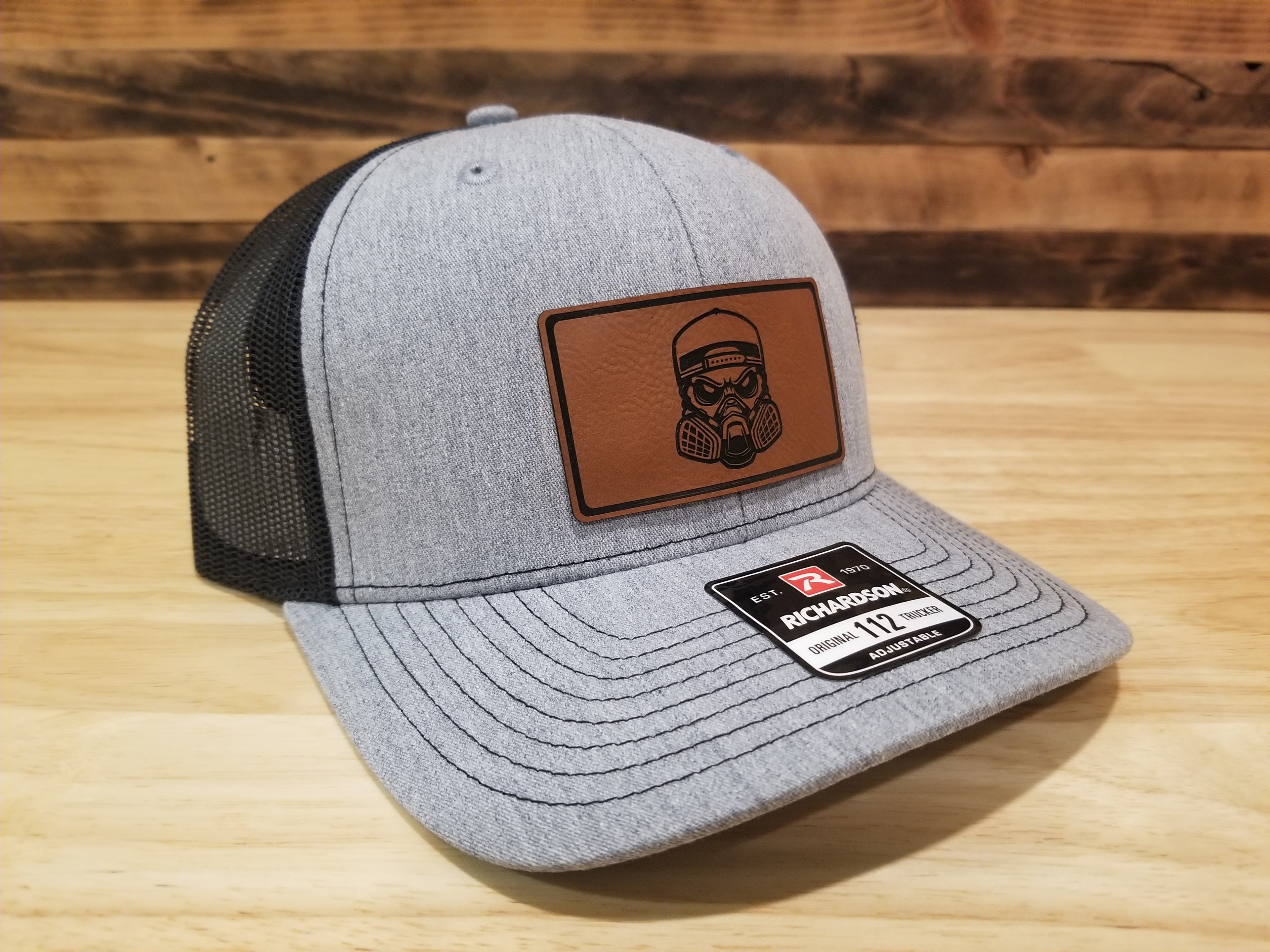 Body Shop Merch Hat with Rawhide Skull wearing paint mask and backwards cap