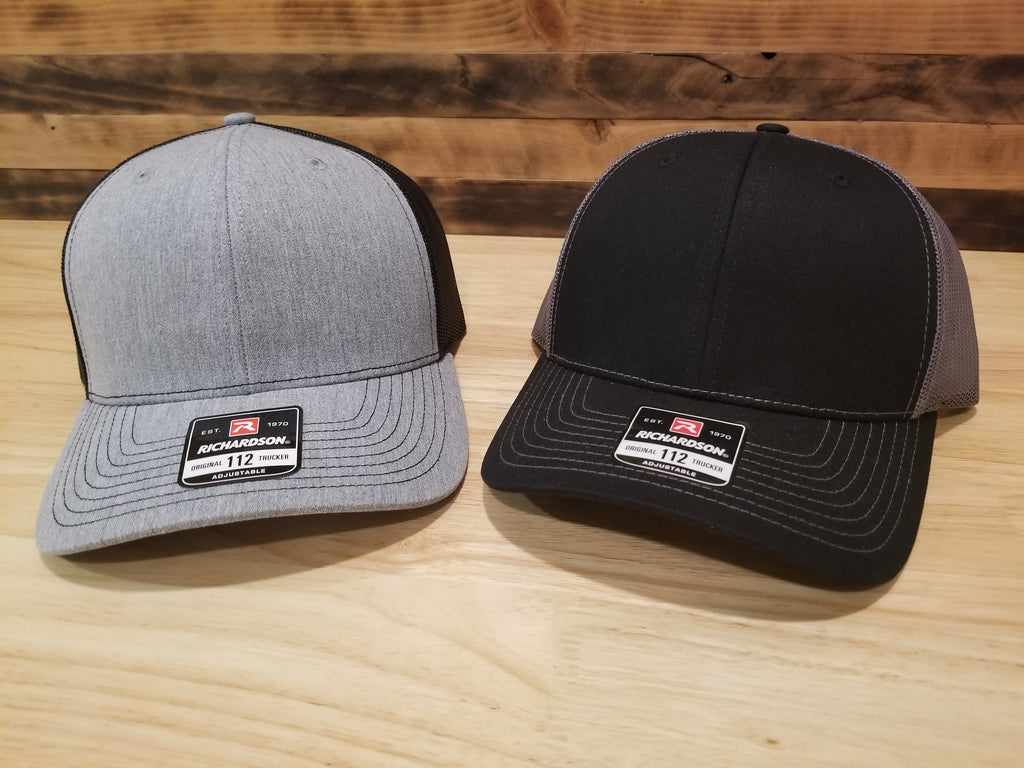 Body Shop Merch Hat with Rawhide patch featuring a skull with paint guns