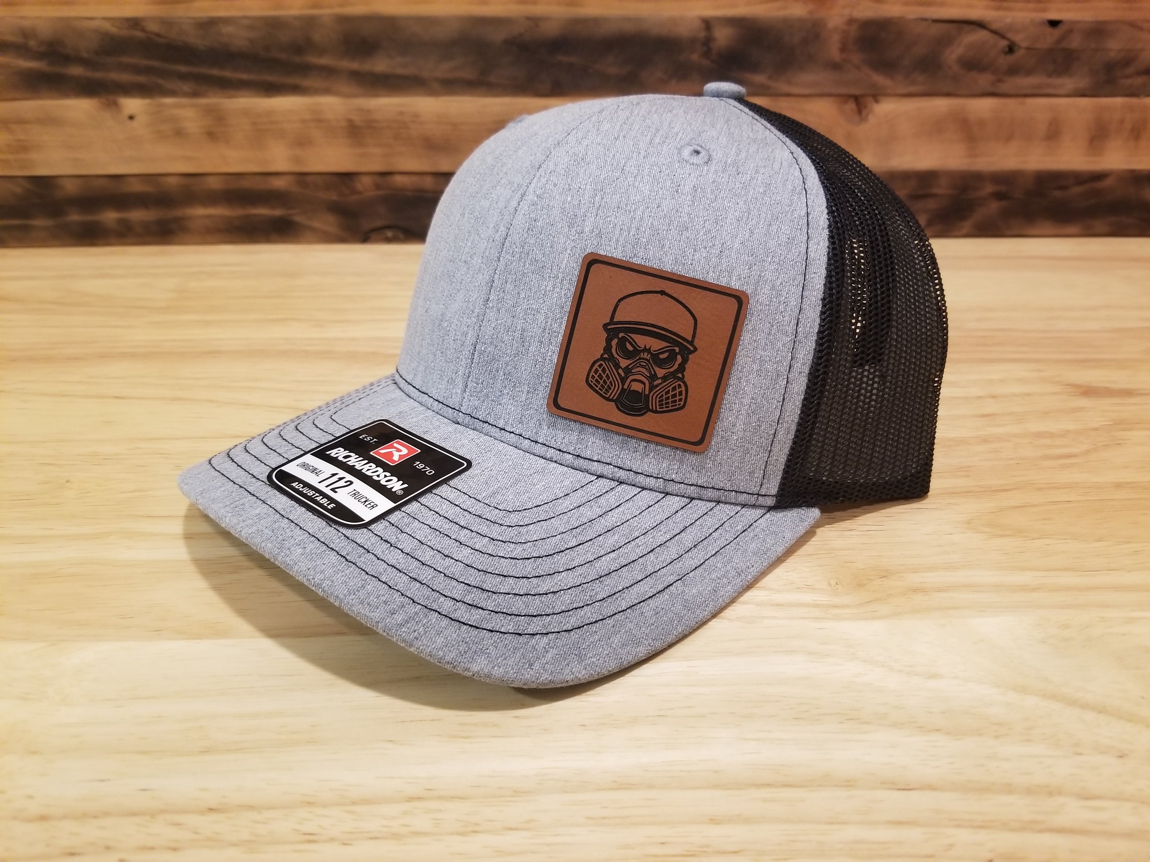 Body Shop Merch Hat with Rawhide Skull wearing paint mask and cap