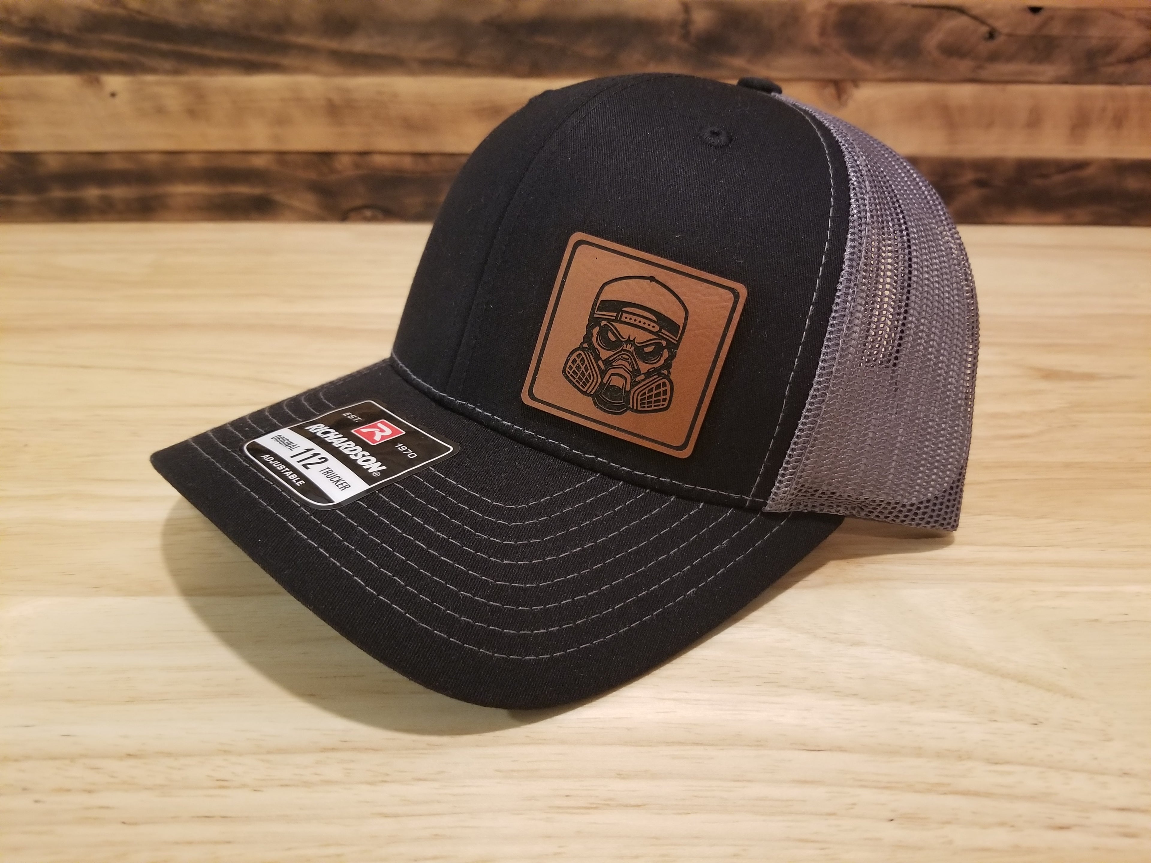 Body Shop Merch Hat with Rawhide Skull wearing paint mask and backwards cap
