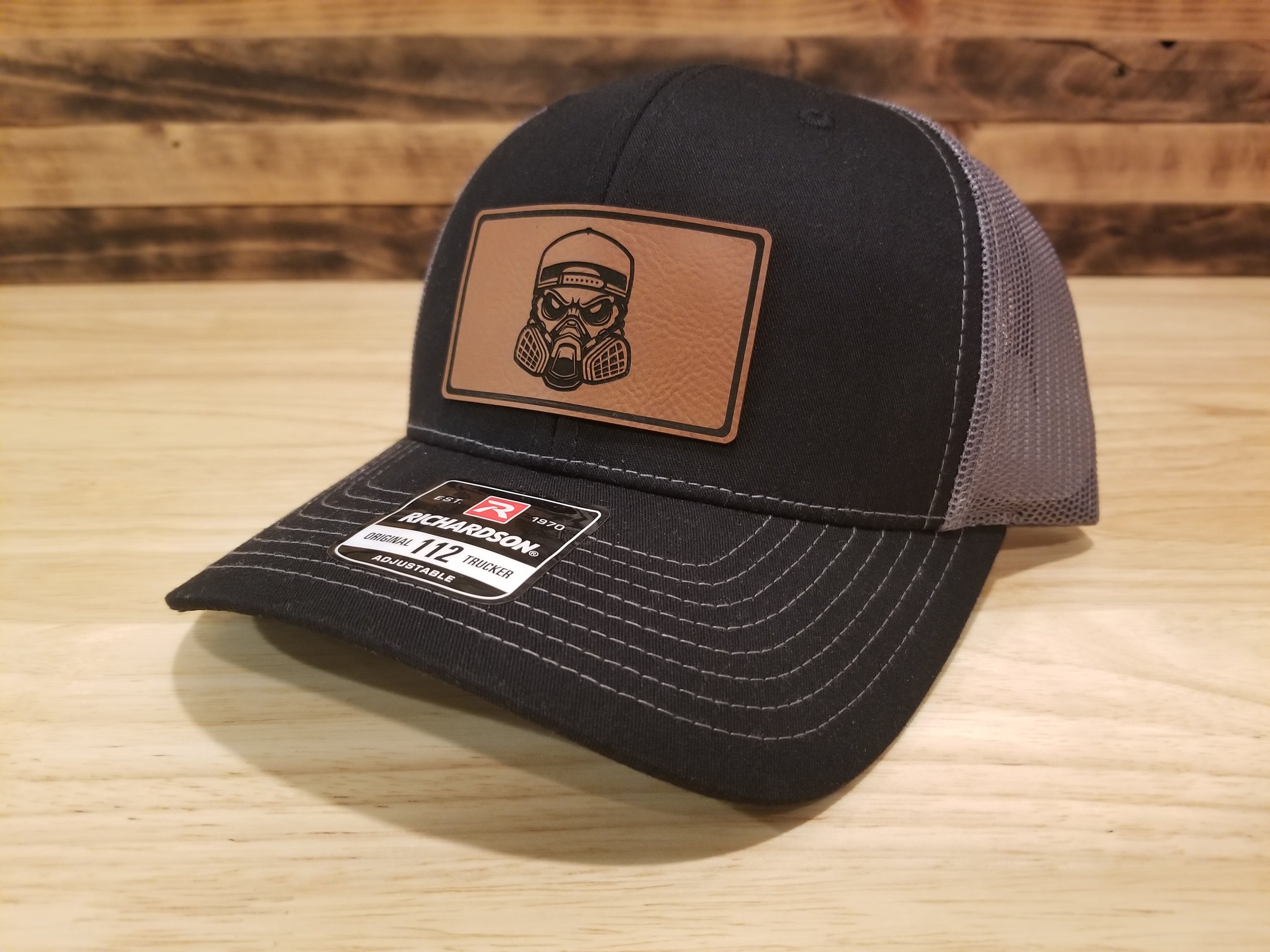 Body Shop Merch Hat with Rawhide Skull wearing paint mask and backwards cap