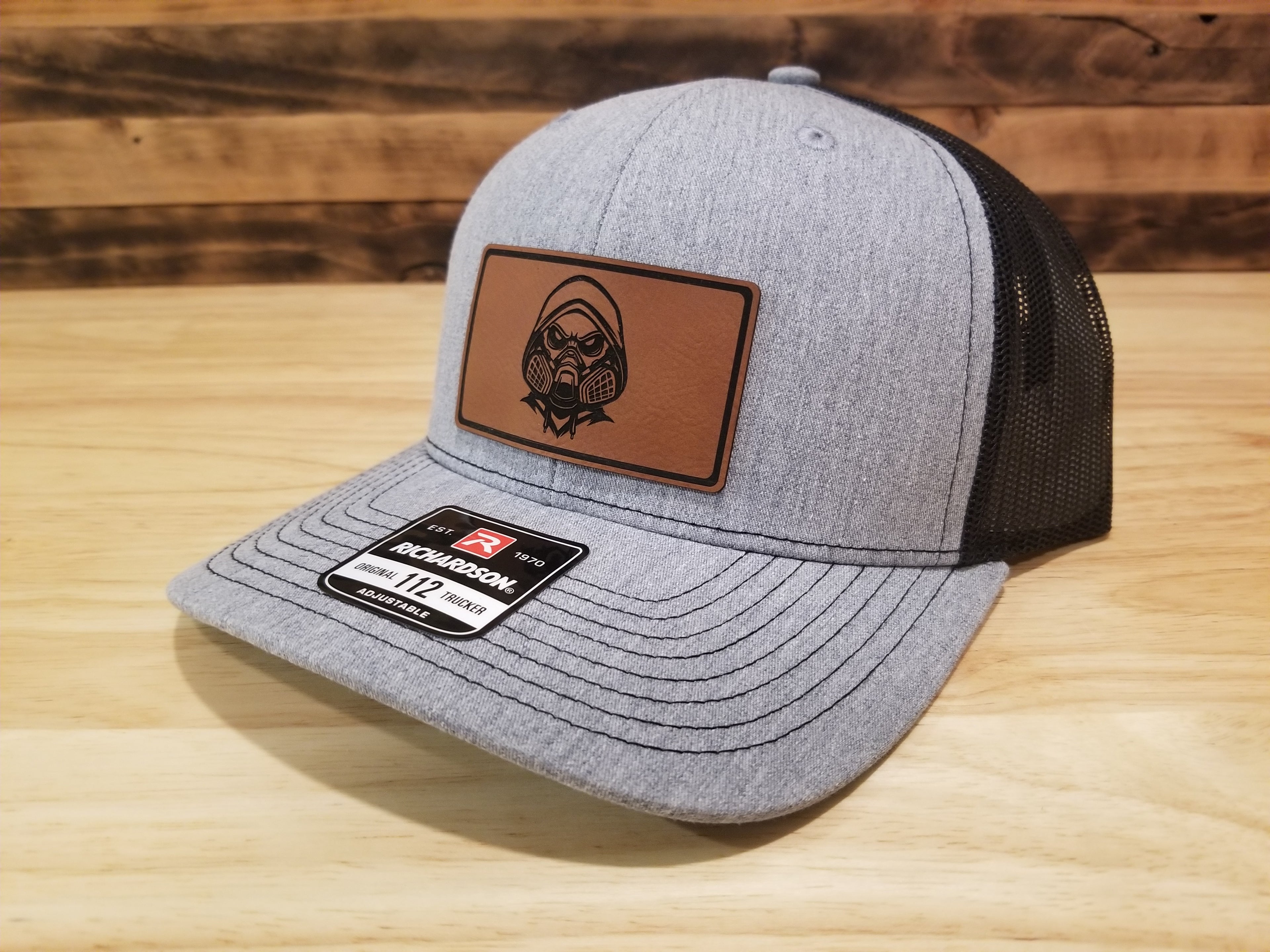 Body Shop Merch Hat with Rawhide Skull wearing paint mask and hoodie
