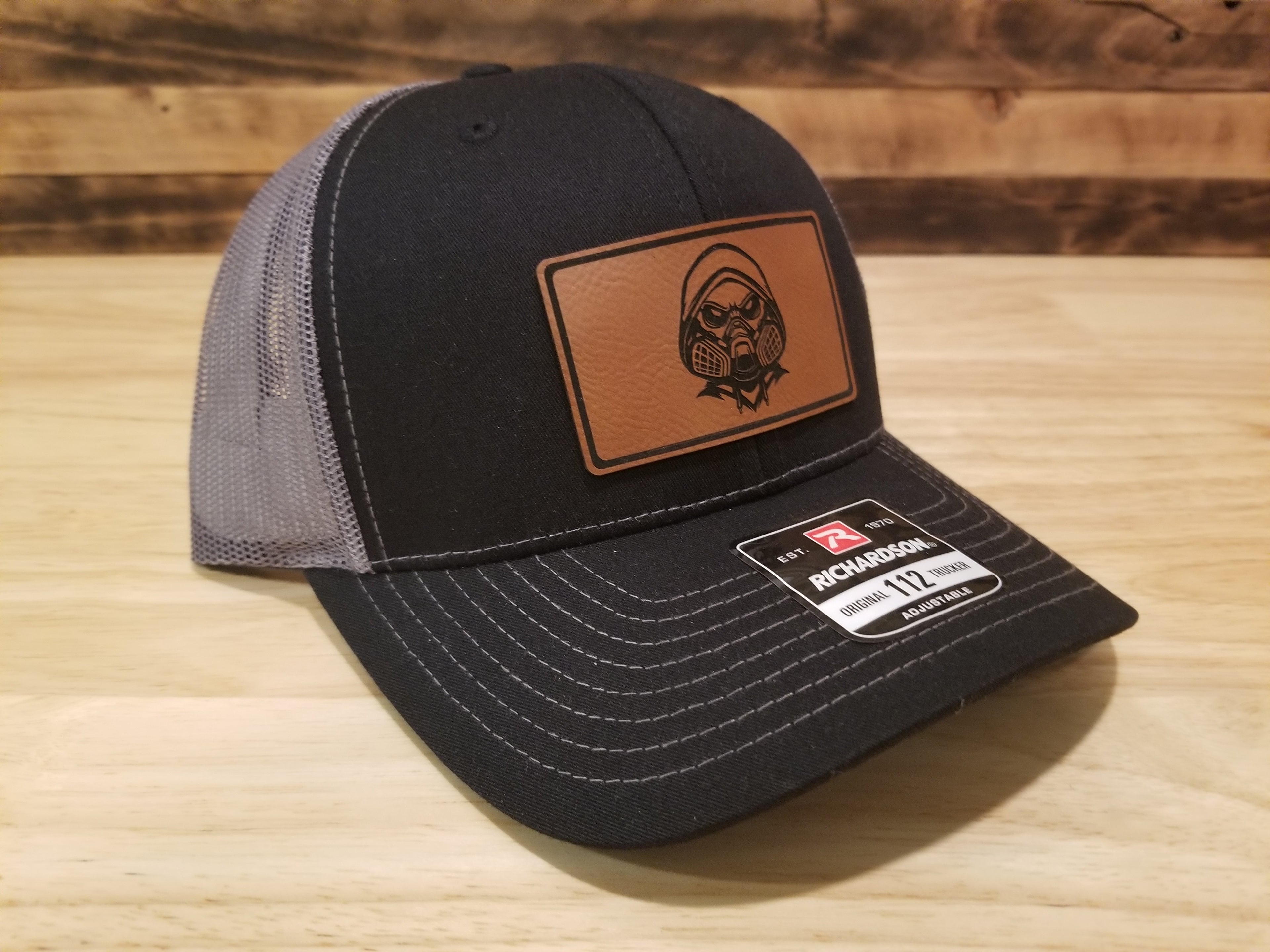 Body Shop Merch Hat with Rawhide Skull wearing paint mask and hoodie