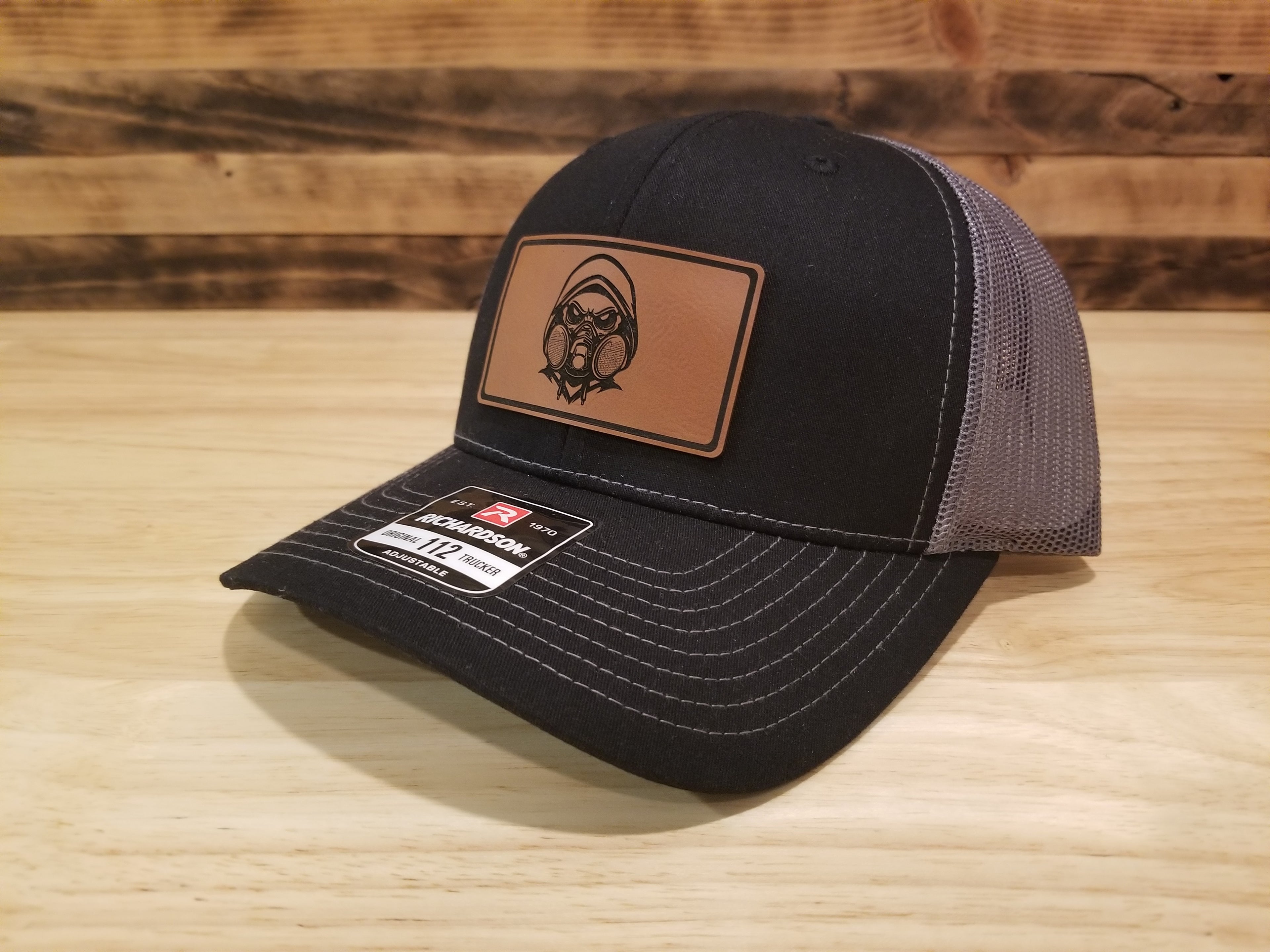 Body Shop Merch Hat with Rawhide Skull wearing dust mask and hoodie