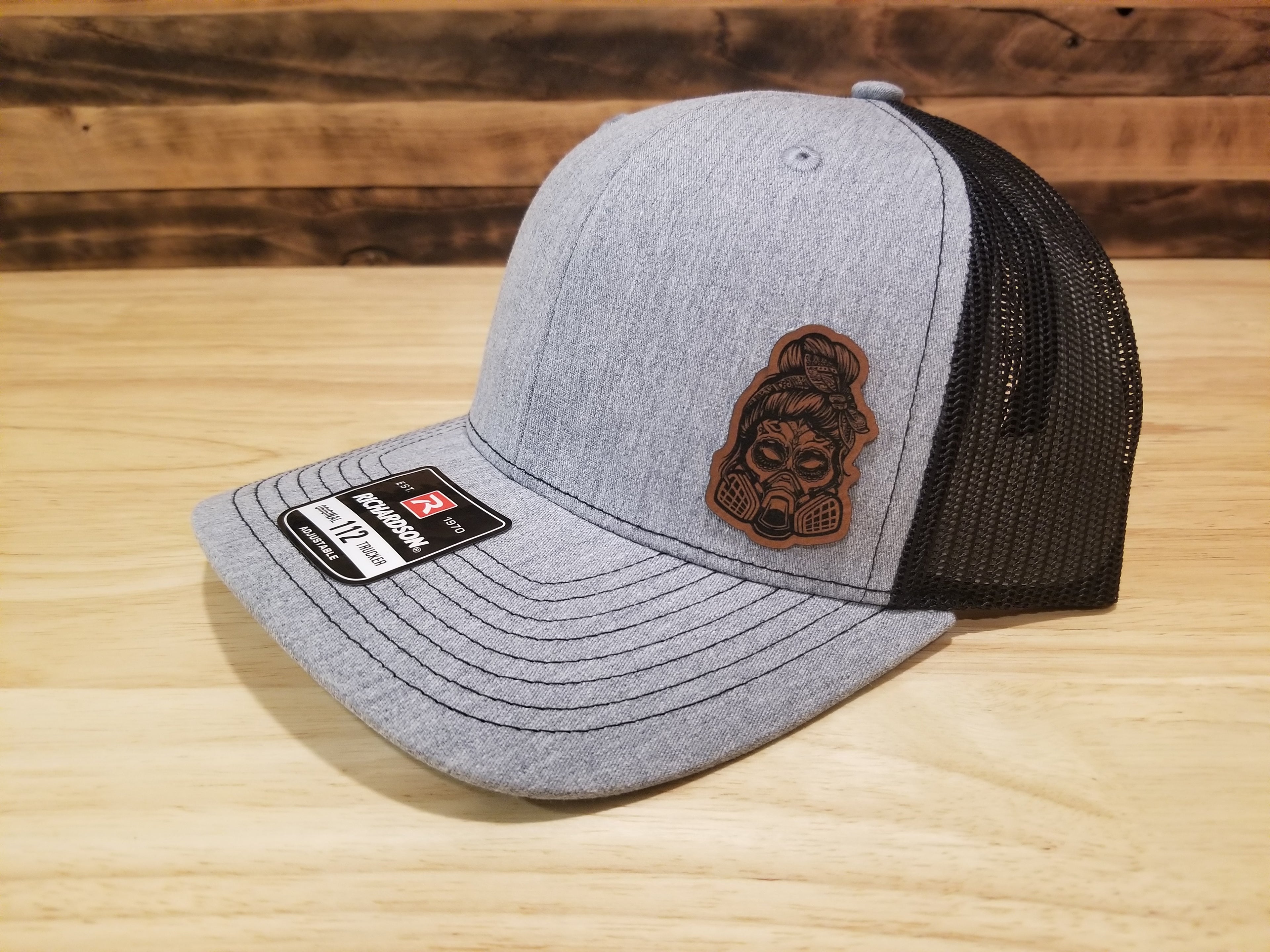 Body Shop Merch Hat with Rawhide Female Skull wearing paint mask