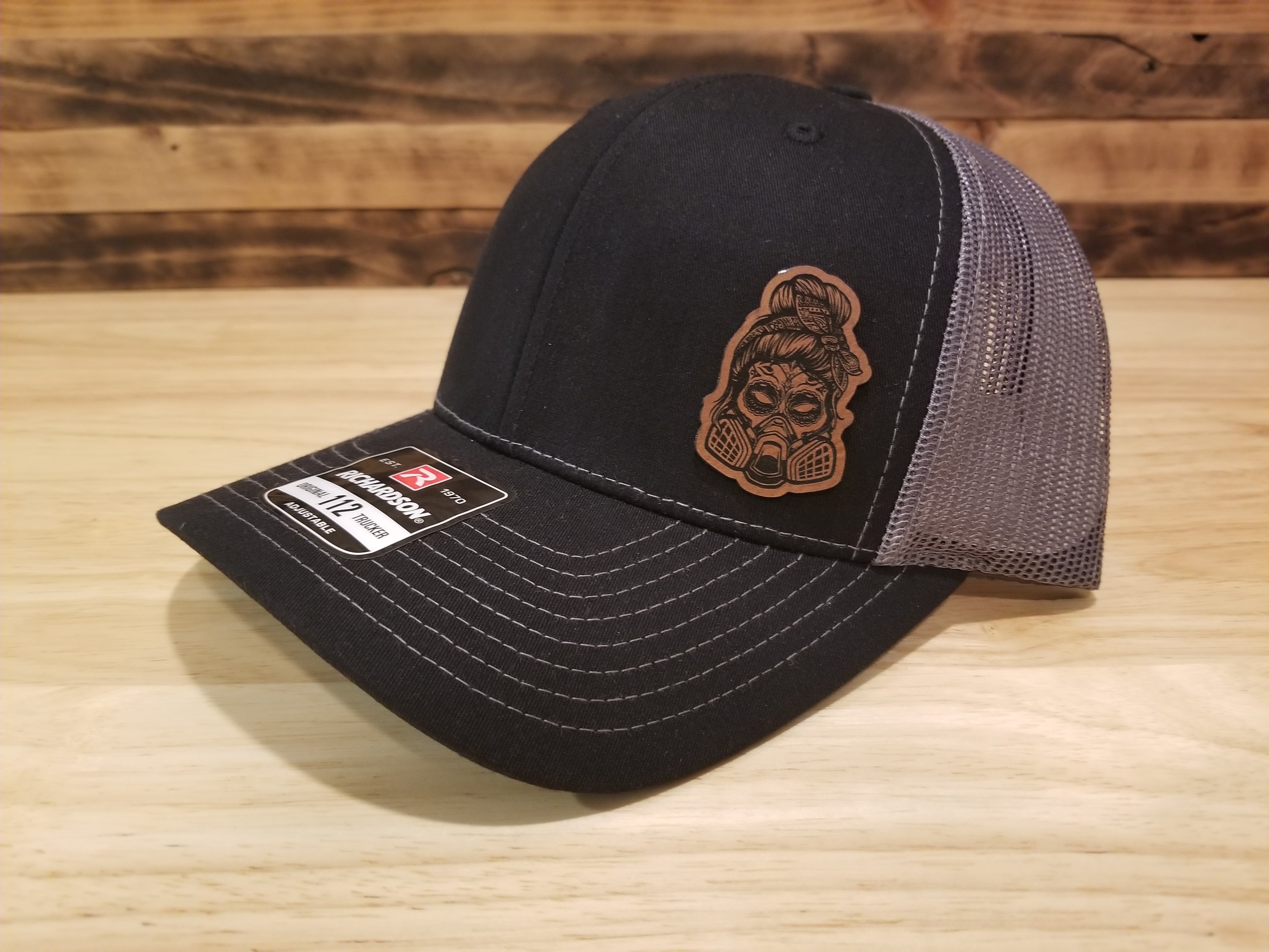 Body Shop Merch Hat with Rawhide Female Skull wearing paint mask